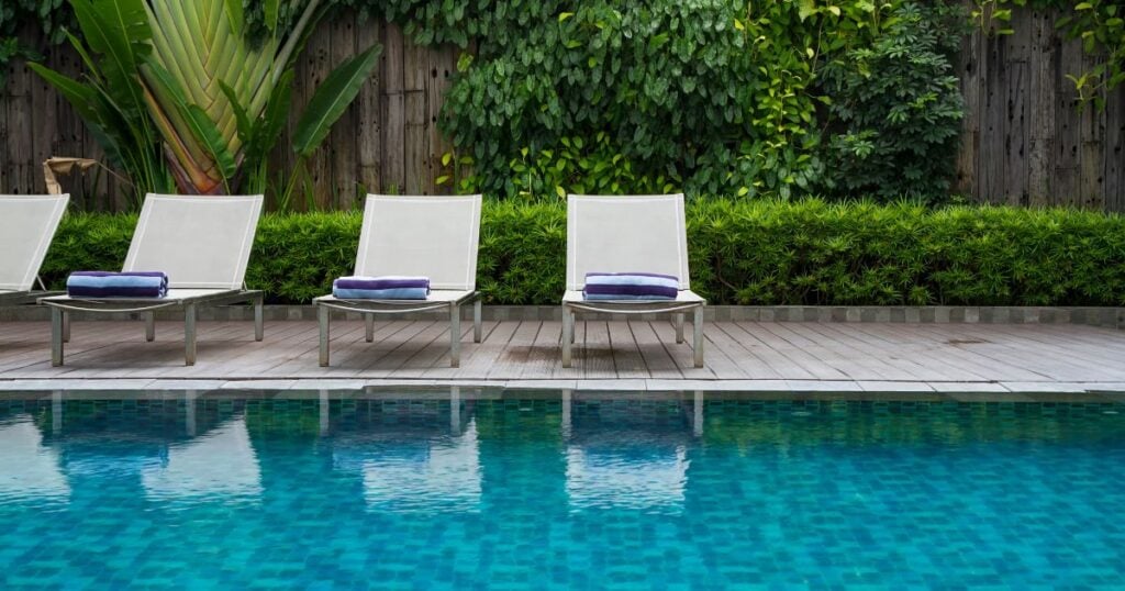 best pool heat pump south africa deck chairs beside swimming pool
